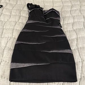 Betsy & Adam party dress! One shoulder, polyester with some spandex.